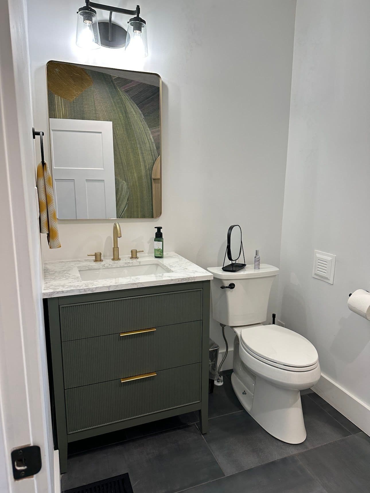 Project Bathroom Revamp with Olive Vanity and Gold Accents image